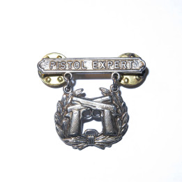 Badge qualification  tireur Colt 45 US Army 1944 bo 52 