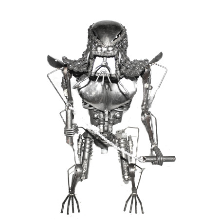 Statuette métallique du Predator avec nunchakus