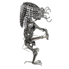 Statuette métallique du Predator avec nunchakus